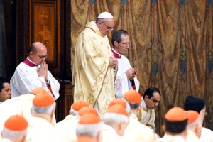 This handout picture released by the Press office shows Pope Francis (C), Argentina's Jorge Mario Bergoglio, leading a mass at the Sistine Chapel at the Vatican on March 14, 2013 a day after his election. Pope Francis and the cardinals who made him the first Latin American leader of the Catholic Church returned to the Sistine Chapel on Thursday, this time to celebrate mass together. AFP PHOTO/OSSERVATORE ROMANO RESTRICTED TO EDITORIAL USE - MANDATORY CREDIT ?AFP PHOTO/OSSERVATORE ROMANO"        (Photo credit should read -/AFP/Getty Images)